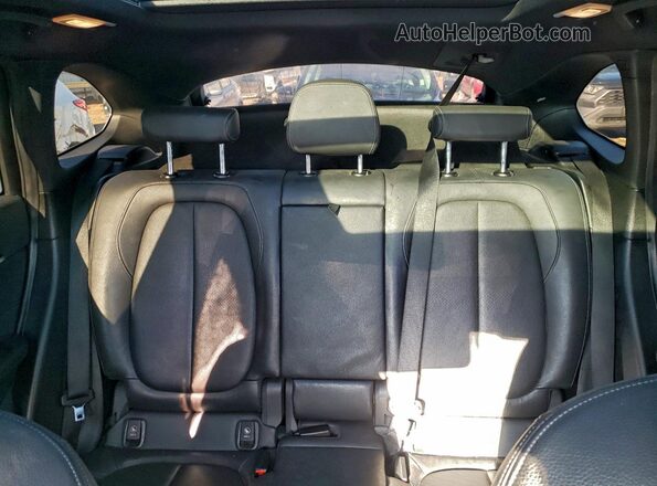 WBXHT3Z33G4A50294 2016 BMW X1 Black Vista de los asientos traseros