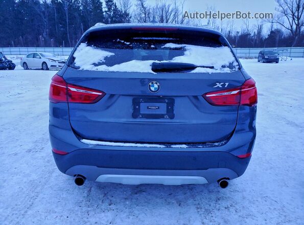 WBXHT3Z35G4A50359 2016 BMW X1 Gray Widok z tyłu