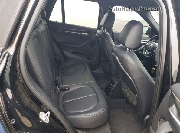 WBXHU7C58K5L12244 2019 BMW X1 Blue Հետևի նստատեղերի տեսք