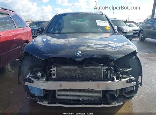 WBXJG7C06M5T57439 2021 BMW X1 Black Սալոնի հետևի տեսք
