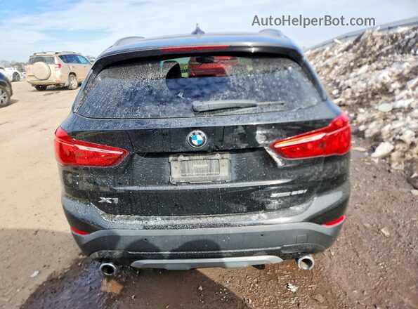 WBXJG7C08M5T51187 2021 BMW X1 Black Vista trasera