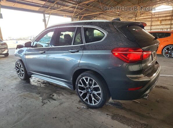 WBXJG9C02N5U81995 2022 BMW X1 Charcoal Trasero izquierdo