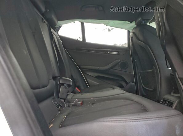 WBXYJ1C03M5S09665 2021 BMW X2 White Սալոնի հետևի տեսք