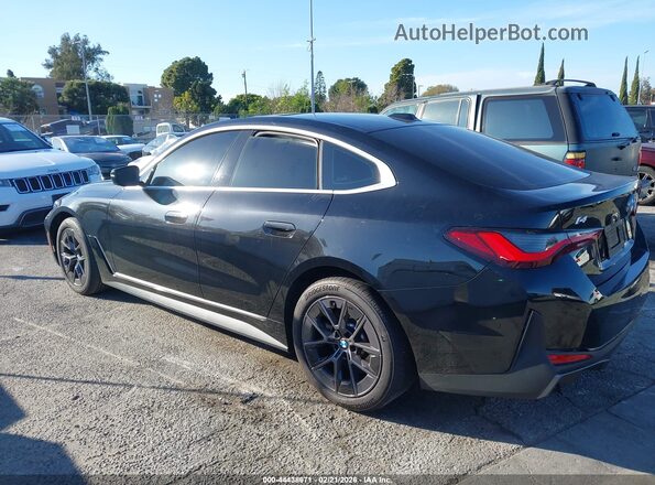 WBY23HD07SFU59856 2025 BMW I4 Black უკანა სალონის ხედი