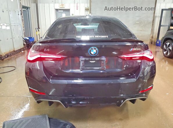 WBY33AW05NFM42406 2022 BMW I4 Black Widok z tyłu