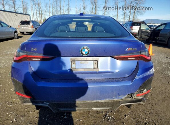 WBY33AW07NFM77108 2022 BMW I4 Blue Հետևի տեսք