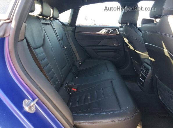 WBY33AW07NFM77108 2022 BMW I4 Blue Հետևի նստատեղերի տեսք