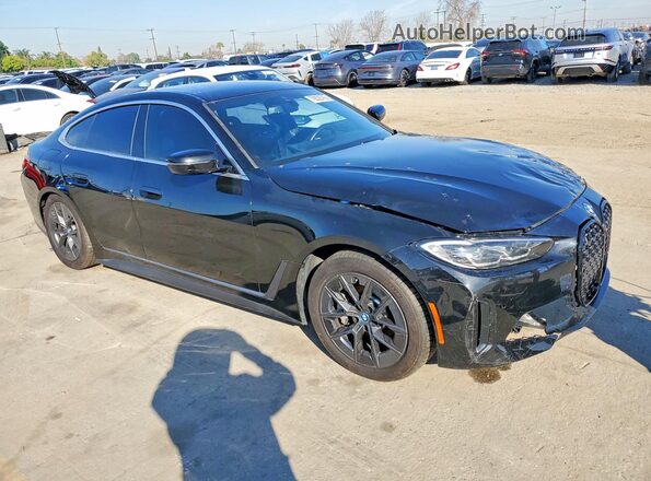 WBY43AW05PFR31699 2023 BMW I4 Black Widok z przodu