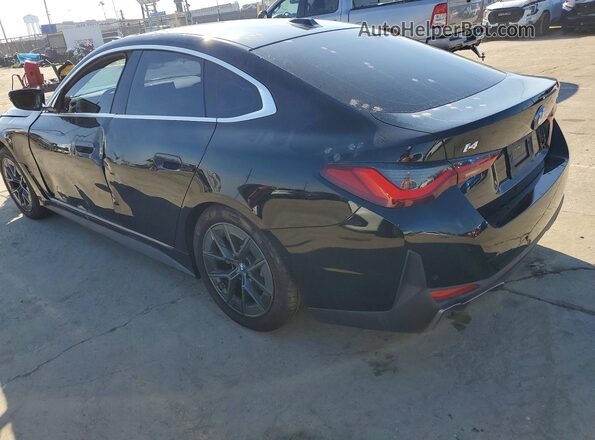 WBY43AW05PFR31699 2023 BMW I4 Black Tył prawy