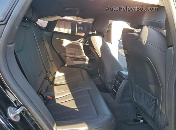 WBY43AW0XRFT38133 2024 BMW I4 Black Vista de los asientos traseros