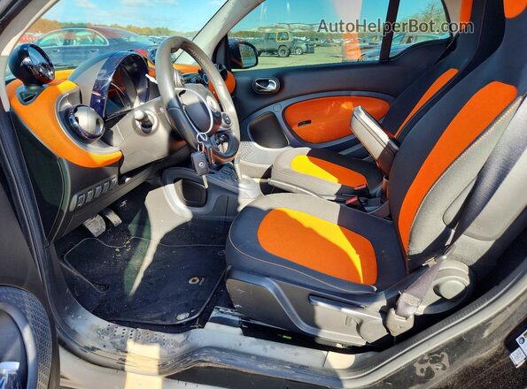 WMEFJ5DA2GK071028 2016 SMART FORTWO Orange Front interior view