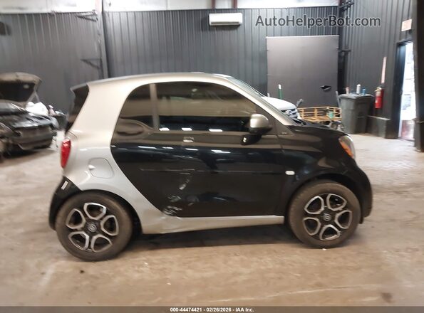 WMEFJ5DA7GK050031 2016 SMART FORTWO Black Rear interior view