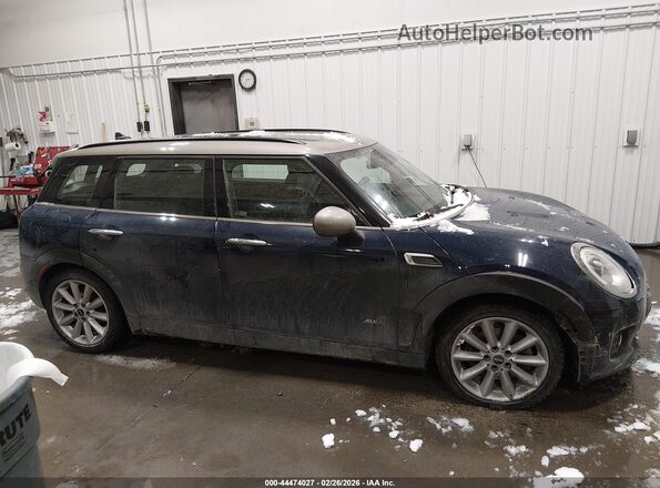 WMWLU1C52J2F29373 2018 MINI CLUBMAN Синий Вид задней части салона