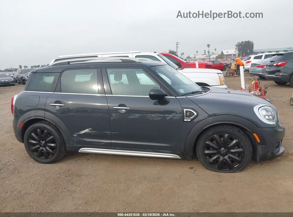WMZYT3C52K3E95986 2019 MINI COUNTRYMAN Gray Vista interior trasera