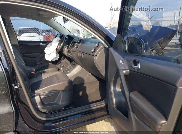 WVGAV7AX5GW520045 2016 VOLKSWAGEN TIGUAN Black Вид салону спереду