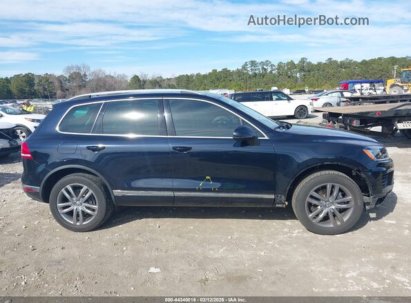 WVGEF9BP5GD011156 2016 VOLKSWAGEN TOUAREG Black Vista interior trasera