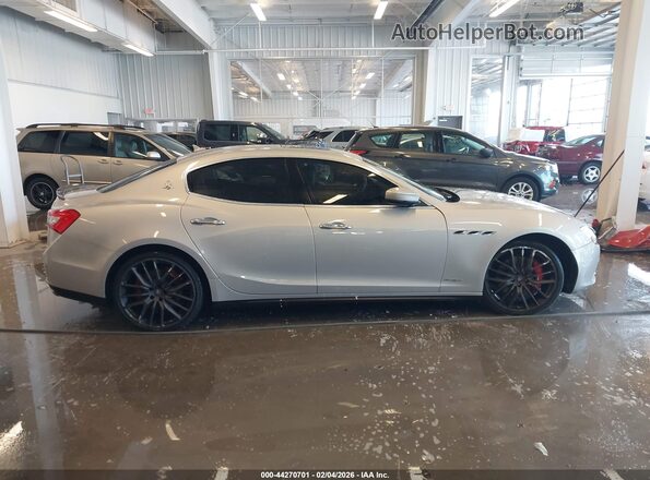 ZAM57RTA7H1240545 2017 MASERATI GHIBLI Серебряный Вид задней части салона