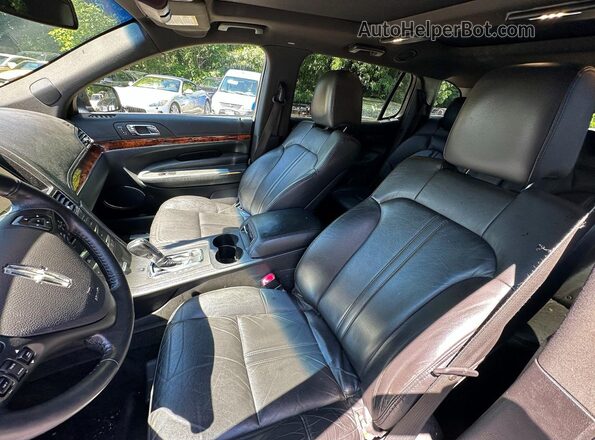 2LMHJ5NK3HBL01668 2017 LINCOLN MKT Black VIN კოდის სტიკერის ხედი