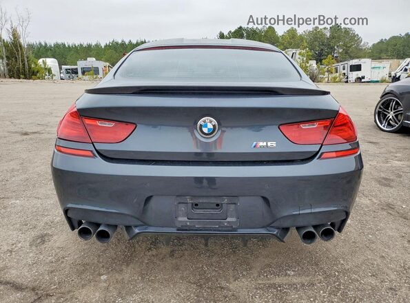 WBS6E9C54JG437590 2018 BMW M6 Gray Vista interior delantera