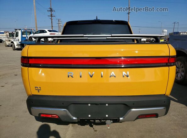 7FCTGAAA2PN019677 2023 RIVIAN RIT Yellow Սալոնի դիմացի տեսք
