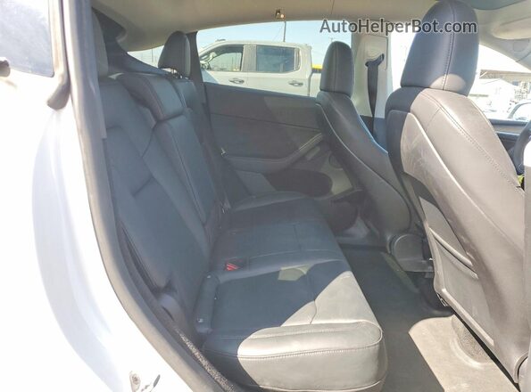 7SAYGDEE9RA222562 2024 TESLA MODEL Белый Вид задней части салона