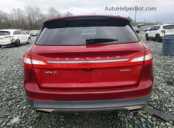 2LMTJ8KR1GBL31618 2016 LINCOLN MKX Красный Вид салона спереди