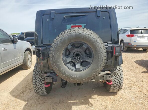 1C4HJWFG2GL145461 2016 JEEP WRANGLER Black Rear view