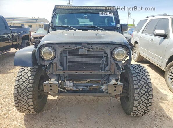 1C4HJWFG2GL145461 2016 JEEP WRANGLER Black Front view