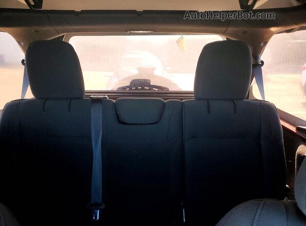 1C4HJXDN5MW594683 2021 JEEP WRANGLER Maroon Rear seats view
