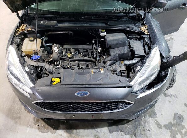 1FADP3F25JL331038 2018 FORD FOCUS Charcoal Widok wnętrza z tyłu
