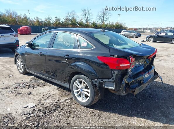 1FADP3F27HL322433 2017 FORD FOCUS Black Front view