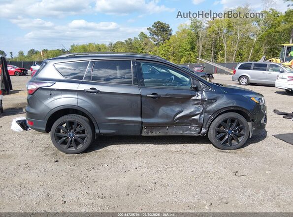 1FMCU0GD1JUD46932 2018 FORD ESCAPE Gray Rear interior view