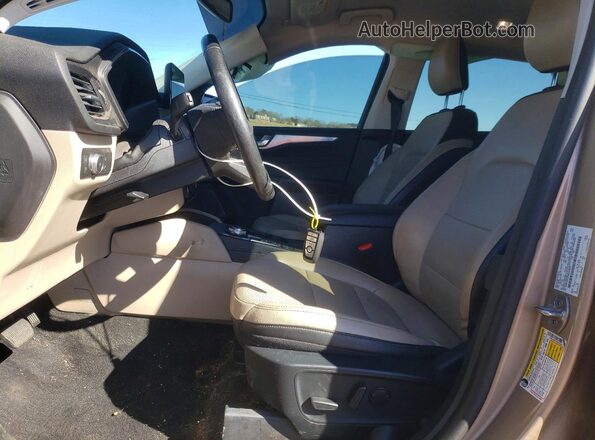 1FMCU9DZ2MUA58927 2021 FORD ESCAPE Желто-коричневый Вид салона спереди