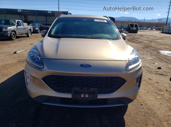 1FMCU9DZ2MUA58927 2021 FORD ESCAPE Желто-коричневый Вид спереди