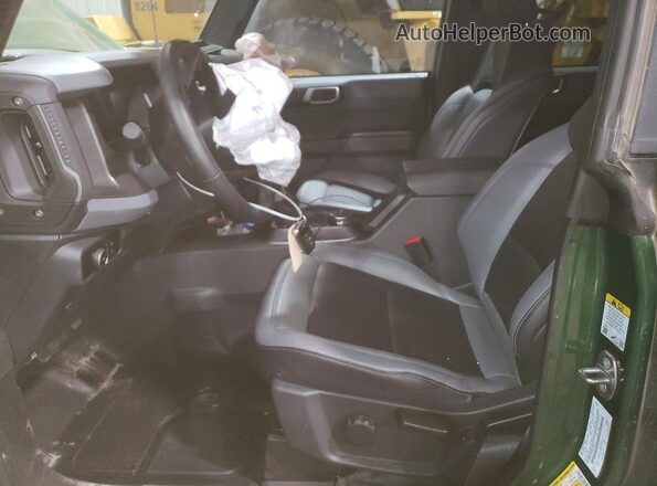 1FMDE7BHXRLB41731 2024 FORD BRONCO Green Vista interior delantera