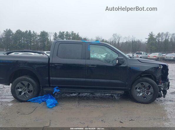 1FT6W3L77SWG00968 2025 FORD F-150 LIGHTNING Black Вид задньої частини салону