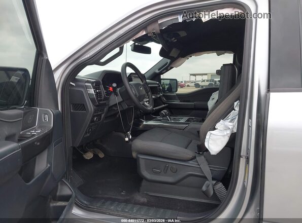 1FTFW1E80PFB49884 2023 FORD F150 Silver Front interior view