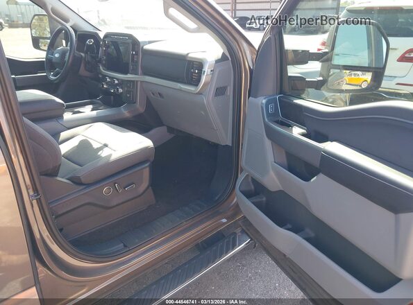 1FTFW1E8XMFC85385 2021 FORD F150 Brown Вид салону спереду
