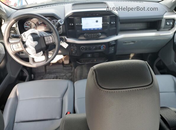 1FTFX1E89PKD58562 2023 FORD F150 Белый Вид панели приборов
