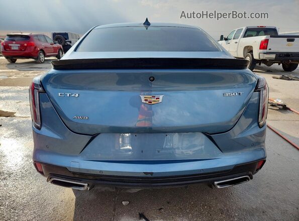 1G6DG5RK4P0123487 2023 CADILLAC CT4 Turquoise Vista trasera