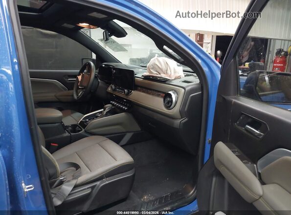 1GCPTFEK3T1146409 2026 CHEVROLET COLORADO Blue Вид салону спереду