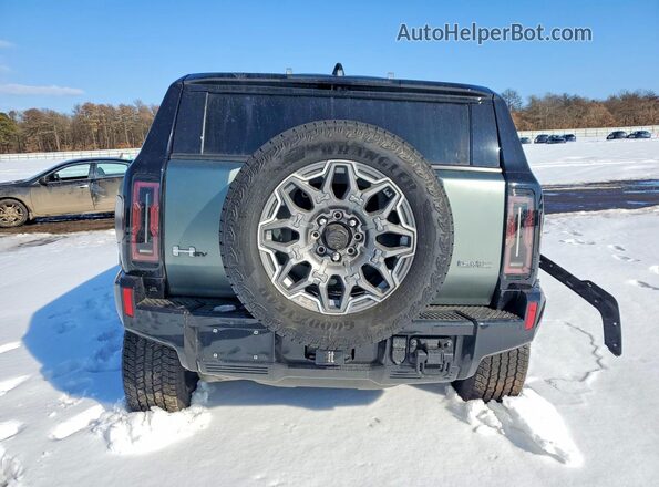 1GKB0RDC5RU100204 2024 GMC HUMMER Green Widok z tyłu
