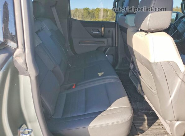 1GKB0RDC5RU100204 2024 GMC HUMMER Green Widok wnętrza z tyłu