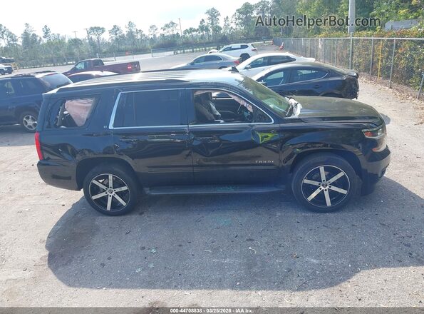 1GNSCAKCXJR107350 2018 CHEVROLET TAHOE Black უკანა სალონის ხედი