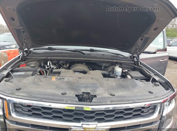 1GNSCBKC0KR299949 2019 CHEVROLET TAHOE Серый Вид сзади