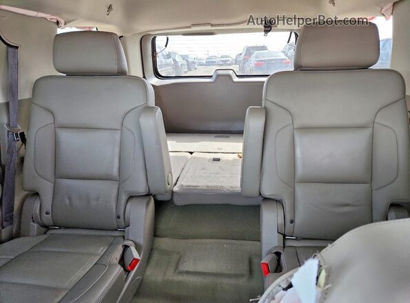 1GNSCBKC5JR282594 2018 CHEVROLET TAHOE Gray Vista de los asientos traseros
