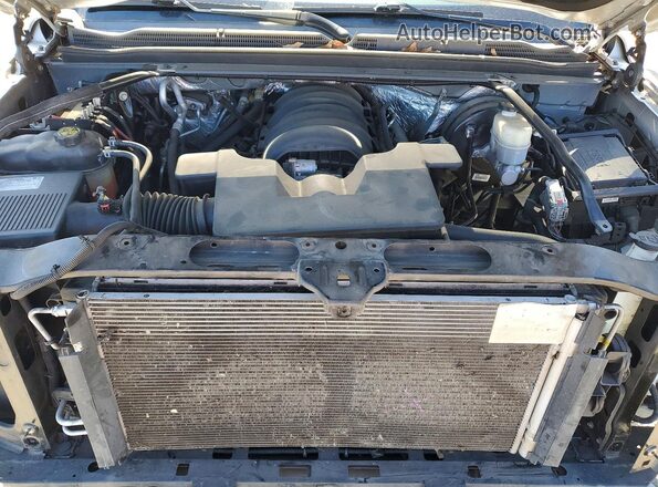 1GNSCBKC7HR166548 2017 CHEVROLET TAHOE Silver Вид підкапотного простору