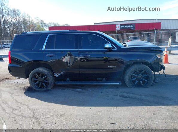1GNSCCKC5GR156458 2016 CHEVROLET TAHOE Black Widok wnętrza z tyłu