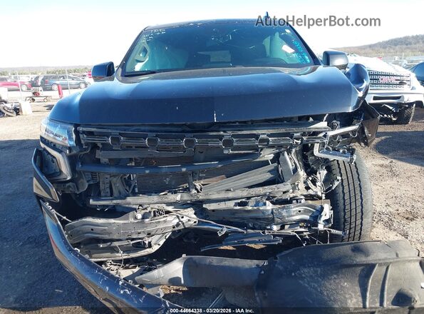 1GNSCMKD6PR117568 2023 CHEVROLET TAHOE Черный Вид задней части салона
