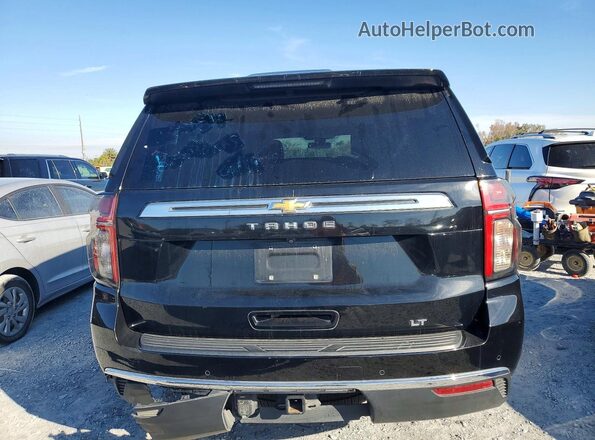 1GNSCNKDXMR275154 2021 CHEVROLET TAHOE Black Rear view